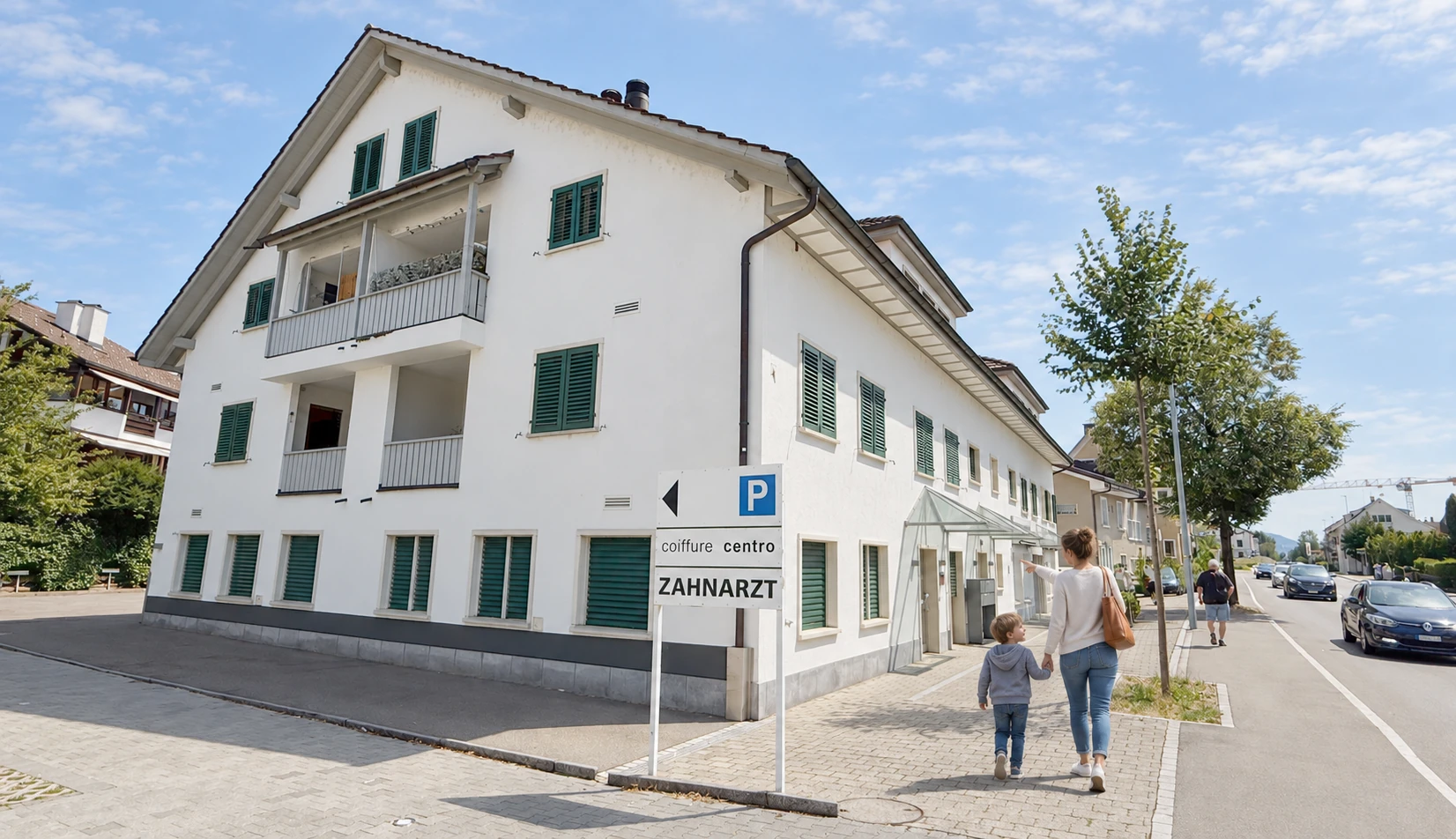 Eine Mutter zeigt ihrem Kind den Eingang der Zahnarztpraxis Müller in Fehraltorf